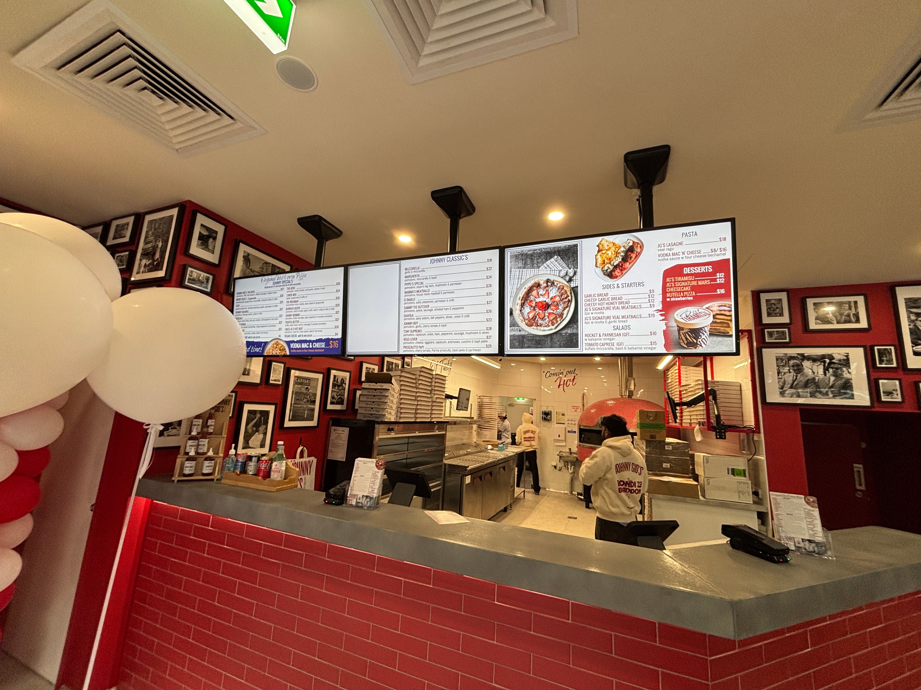 Ceiling mounted menu boards – Johnny Gios opening day
